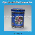 Eleganter keramischer blauer Zuckerkanister mit Blumenfigur